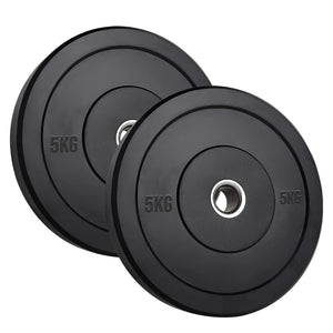 Two black weight plates with '5KG' marking on a white background