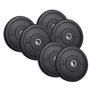 Set of black weight plates with weight markings on a white background