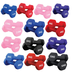 Set of colorful dumbbells with weight labels on a white background