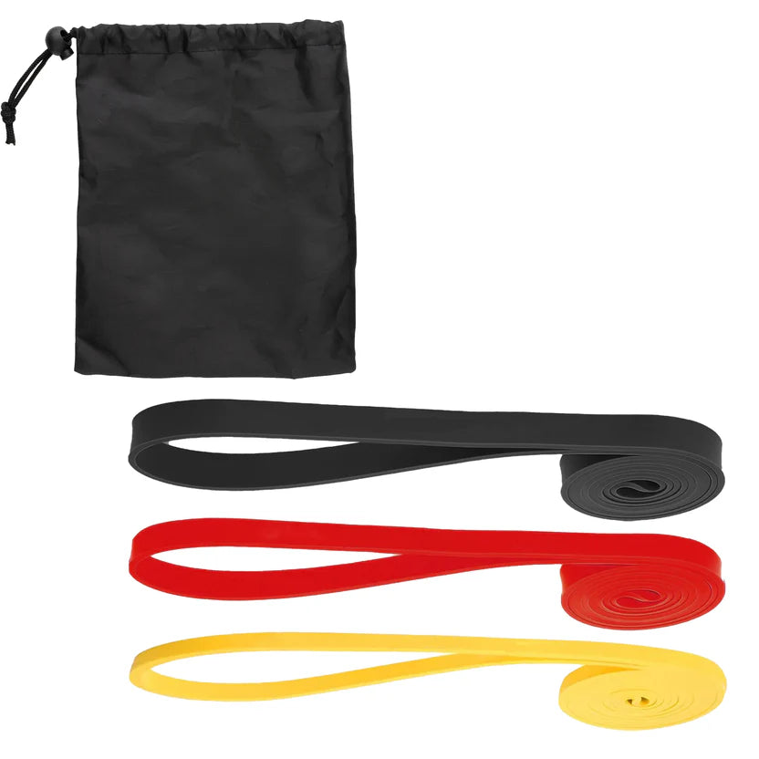 Black resistance band set with red and yellow bands and a black drawstring bag on a white background