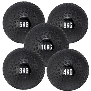 Set of black weighted balls with labeled weights on a white background