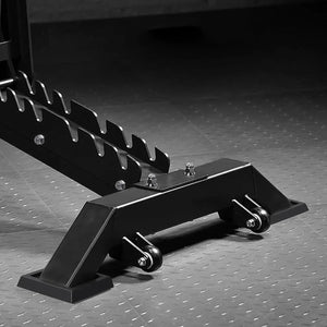 Black metal car jack stand on a textured gray surface