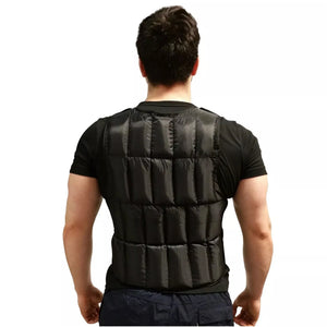 Person wearing a black weighted vest on a white background