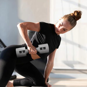 Woman exercising with a resistance band in a home setting