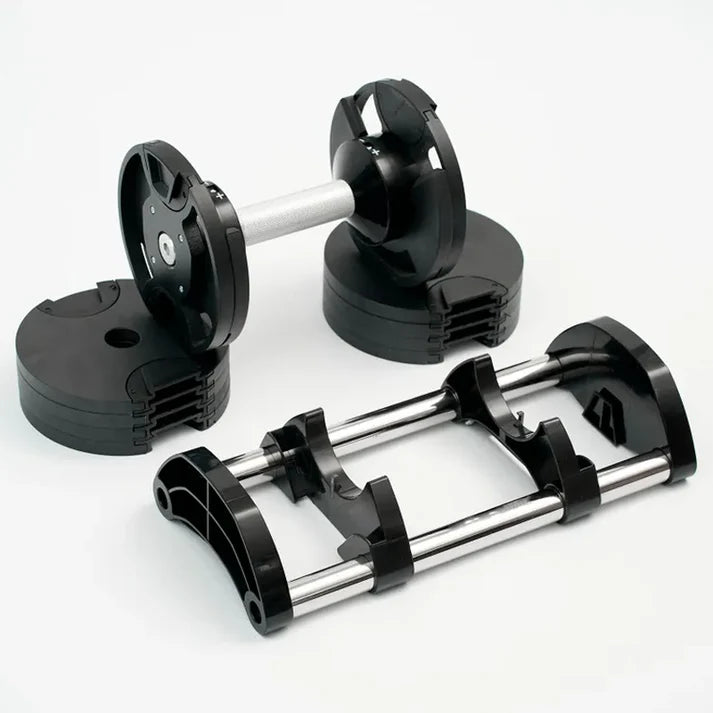 Pair of adjustable dumbbells on a white background