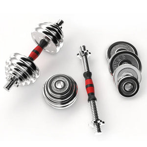 Set of adjustable dumbbells with weight plates on a white background