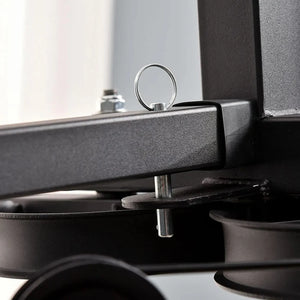Close-up of a mechanical component with a metallic finish on a blurred background