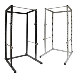 Black and silver power rack on a white background