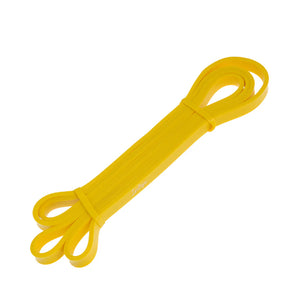 Yellow resistance band on a white background
