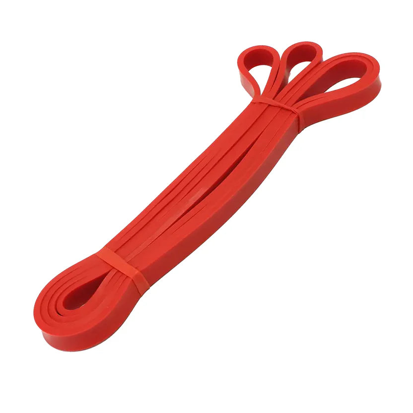 Red resistance band on a white background
