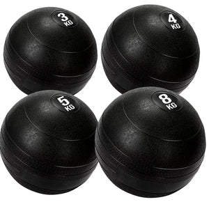 Four black exercise balls with weight markings on a white background