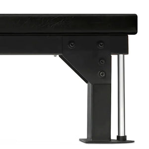 Black metal bench with a white background