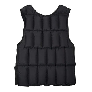 Black puffer vest on a white background